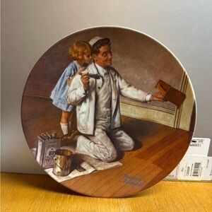 Edwin M. Knowles China Company, titled "The Painter" by Norman Rockwel